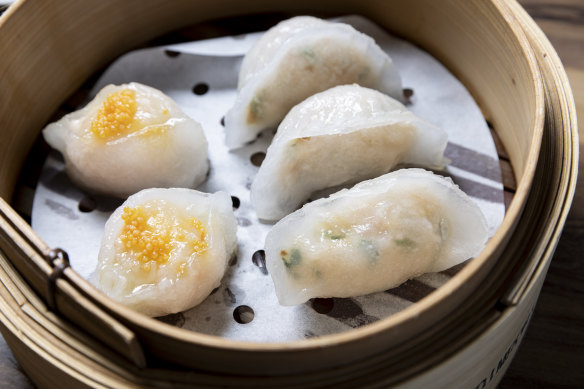 Prawn and chive dumplings (right) and scallop and prawn dumplings.