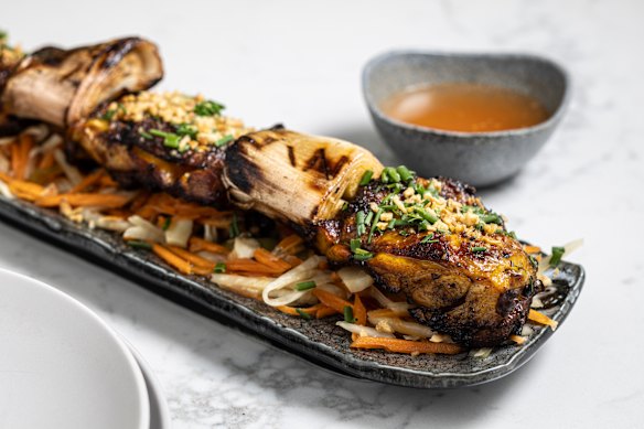 Chicken inasal skewers basted with spiced chicken oil.
