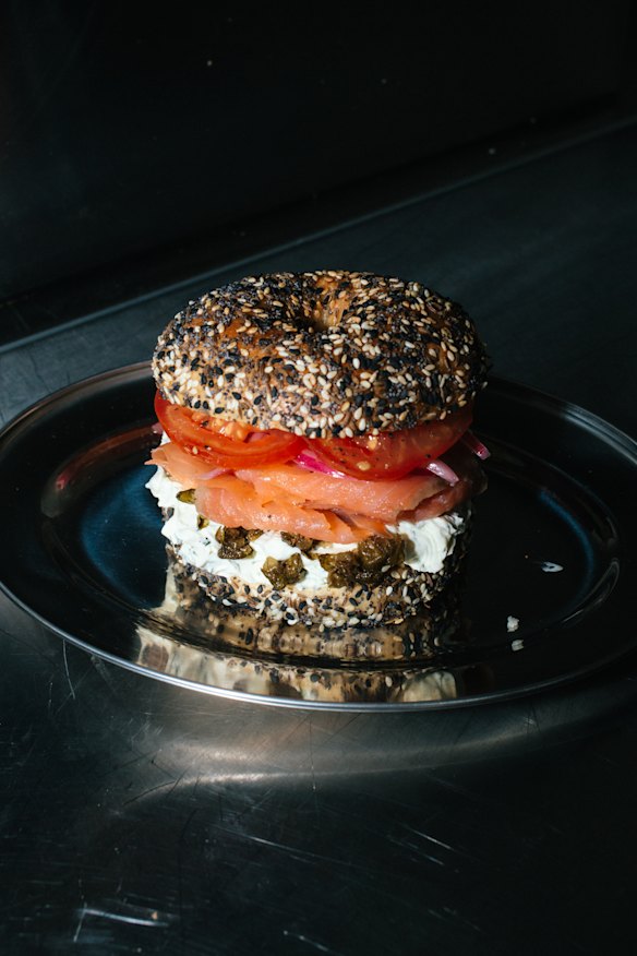 Salmon bagel with lox, herb cream cheese, pickled red onions &amp; fried capers.