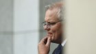 Scott Morrison, pictured in Canberra on Wednesday, says he is discussing George Christensen’s future with Nationals leader Barnaby Joyce.