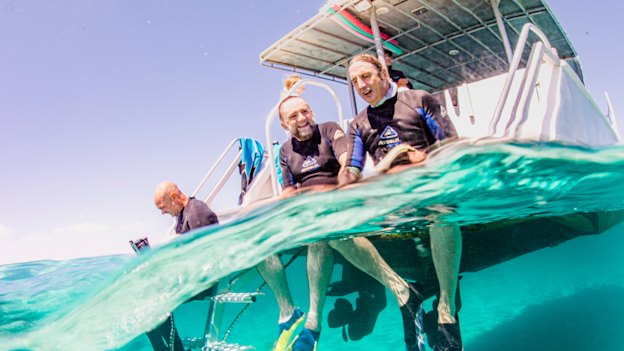 From left: cinematographer Rick Rifici, director Robert Connolly and Tim Winton on location at Ningaloo Reef, where most of the underwater work for Blueback was filmed. 