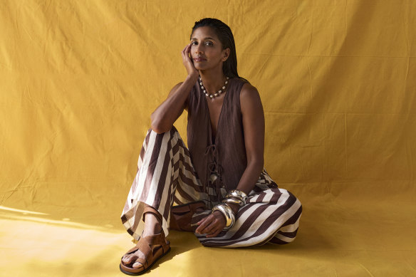 Zara waistcoat, $70. Elka Collective “Lumi” pants, $269. Lucy Folk “Pisces” choker, $750. Dinosaur Designs bangles, from $55 (worn throughout). A.Emery “Jalen” sandals, $220 (worn throughout).