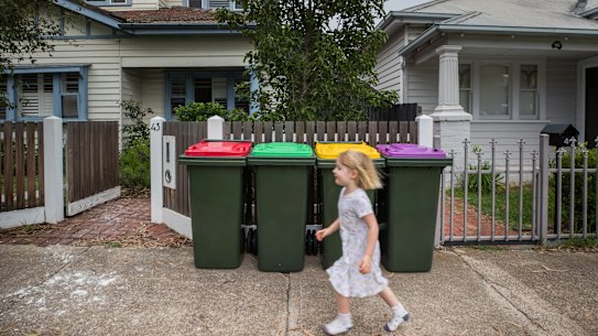 Three year old Abby runs past bins in Spotswood, Melbourne. Australian environment Minister Sussan Ley wants bin “harmonisation” to ensure all guidelines are the same. 