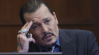Johnny Depp testifies in a Virginia courtroom.