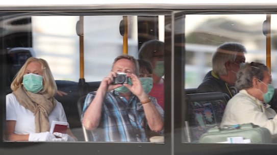 Passengers from the Artania cruise ship were transported from the Fremantle Passenger Terminal on buses by a police escort to Perth International airport to board a chartered Condor flight to Germany last week.