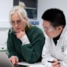 Monash University’s Professor Mary Herbert with a colleague. 