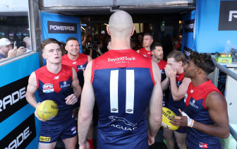 Max Gawn leads the Dees onto the field. 
