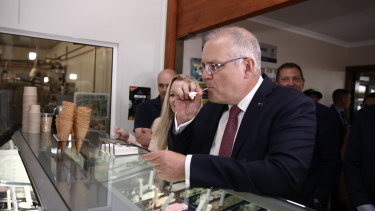 Scott Morrison and the Liberal candidate for Lyons, Jessica Whelan, sample ice-cream in Elizabeth Town, Tasmania.