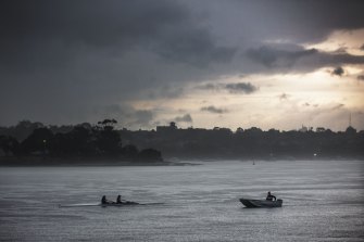 Lightning and rain passed over rowers in Haberfield, in Sydney’s inner west, late on Thursday. 