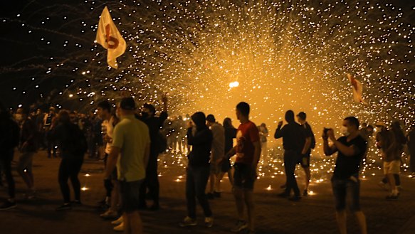 Police use smoke grenades during a protest after the Belarusian presidential election in Minsk, Belarus.