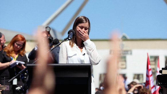 Brittany Higgins speaks at the March 4 Justice protest to rally against the Australian Parliament’s ongoing abuse and discrimination of women in Australia at Parliament House in Canberra on March 15, 2021. 