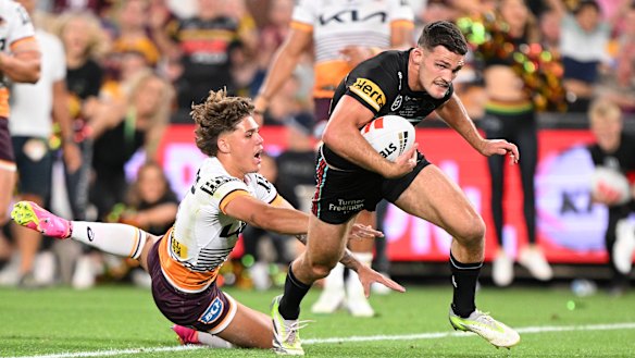 Nathan Cleary powers past Reece Walsh to score in the 2023 grand final. His man of the match performance was achieved largely while playing a different role.