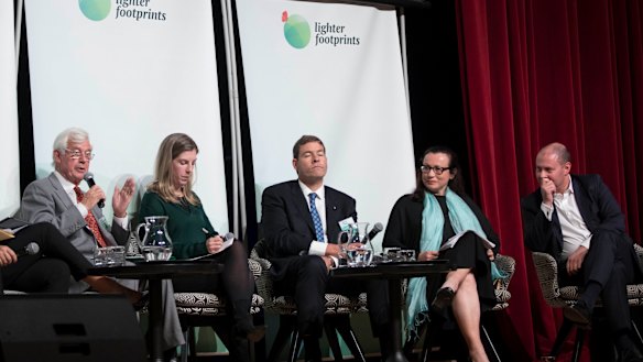 Kooyong candidates including Josh Frydenberg (right), Oliver Yates (centre) and Julian Burnside (left) attend a Lighter Footprints community climate forum.