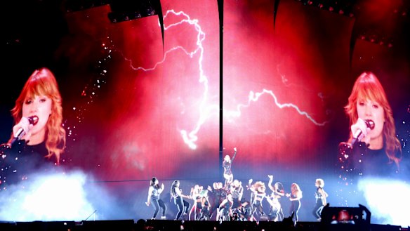 Swift balances anthemic, empowering bombast with intimate acoustic moments.