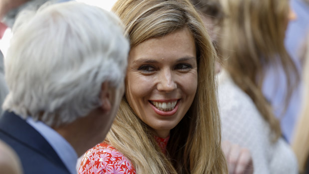 Carrie Symonds, partner of Boris Johnson, stands outside 10 Downing St. 