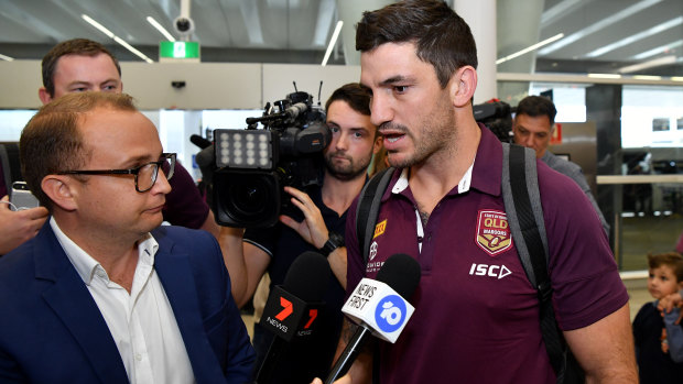 Scratched: Matt Gillett arrives at Sydney Domestic Airport on Monday.