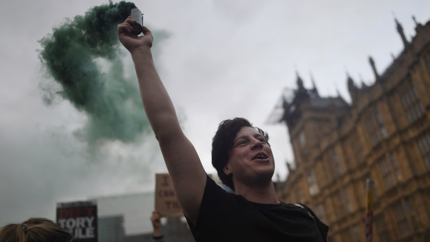 Pro EU campaigners demonstrate outside the House of Commons in London on Tuesday.