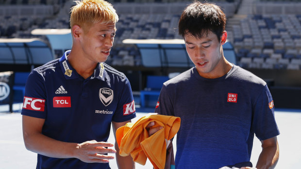 Lone star: Melbourne Victory's Japanese marquee Keisuke Honda , pictured at the Australian Open with countryman Kei Nishikori on Friday - is the only Asian player in the A-League.