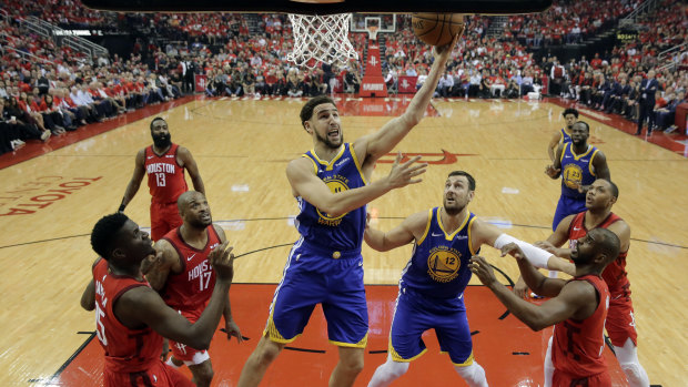 Andrew Bogut (centre right) relished the series win over Houston.