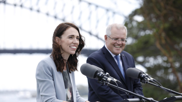 Prime Minister Scott Morrison with New Zealand counterpart Jacinda Ardern. Citizens of both countries highly rate their governments' reactions to the pandemic.