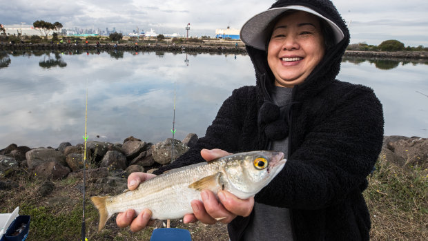 Thao Le with her catch at the Warmies on Friday afternoon.