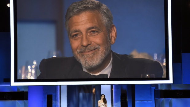 George Clooney crying in response to his wife's speech.