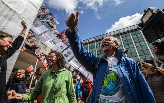 Environmental activists celebrated the verdict in the case against Shell in the Hague.