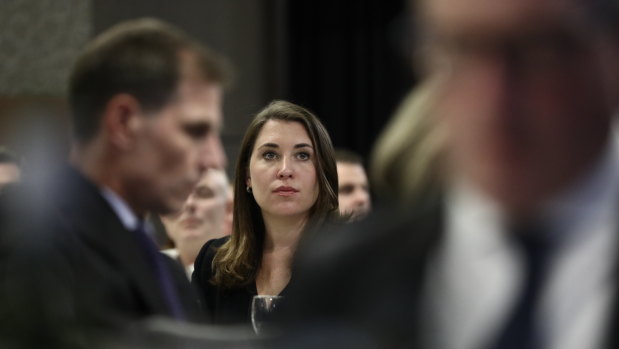 Journalist Annika Smethurst, whose home was raided by the Australian Federal Police, listens on as media bosses call for greater press freedom.