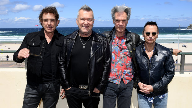 Australian rock icons Cold Chisel - Ian Moss, Jimmy Barnes, Don Walker and Phil Small - at Bondi Beach.