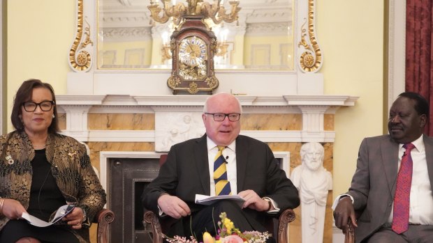 From left to right: Commonwealth Secretary-General Baroness Patrica Scotland, Australia’s High Commissioner to the UK George Brandis and Kenya’s Presidential candidate Raila Odinga at Marlborough House, London.