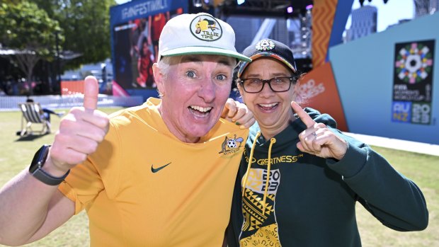 Matildas fans Julie Ryan (left) from Melbourne and Lynne Kunins from Florida at the FIFA Women’s World Cup live site at South Bank.