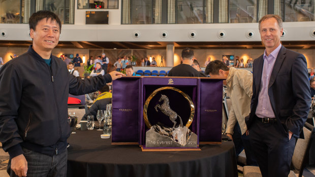 Yulong Investments' Yuesheng Zhang and Triple Crown Syndications' Michael Ward with The Everest trophy.