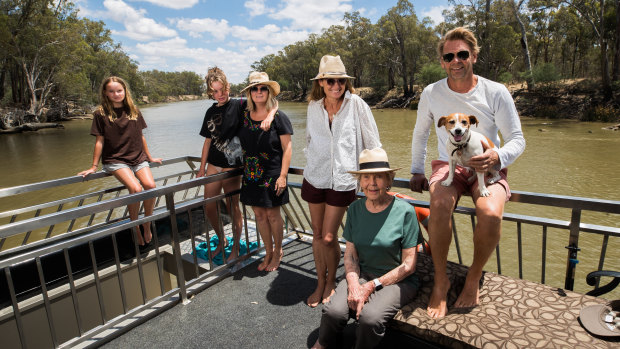 The Meagher family on board their plan B holiday accommodation, a boat on the Murray.