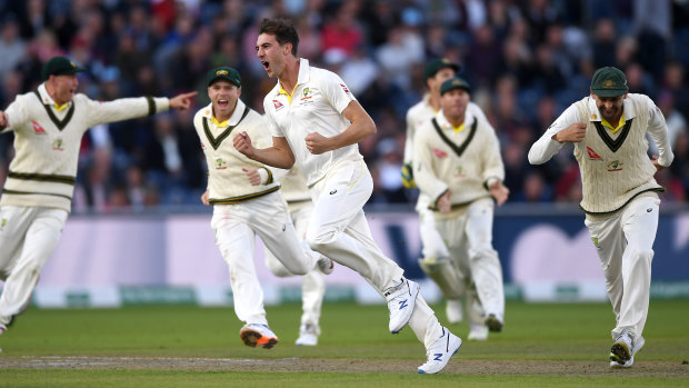 Pat Cummins celebrates dismissing England captain Joe Root during day four of the fourth Ashes Test.