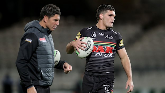 Panthers assistant Trent Barrett with halfback Nathan Cleary before last week's game against South Sydney.