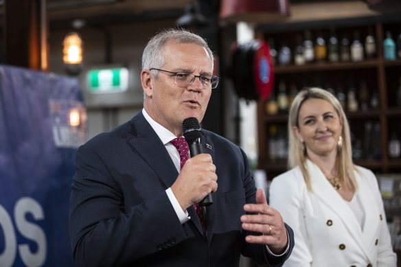 Sarah Richards with the Prime Minister at an event in December 2021.