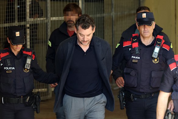 Jonathan Andic was brought to court in handcuffs, where the judge set bail of 1 million euros and required him to hand over his passport.