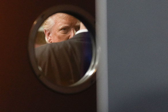 Republican presidential nominee former President Donald Trump is seen through a window in the kitchen of the ll Toro E La Capra Mexican restaurant in Las Vegas.