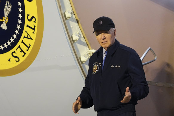 President Joe Biden walks down the steps of Air Force One at Dover Air Force Base in Delaware on Wednesday.