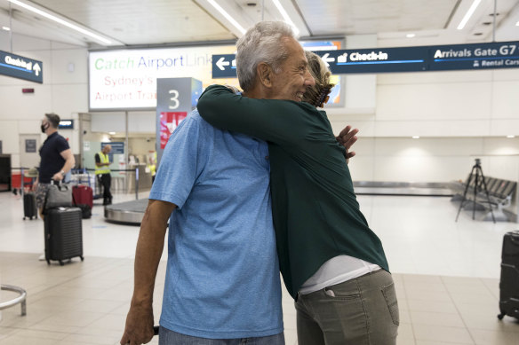 Father Larry McConnie is reunited with his daughter Kim McConnie after the borders reopened in December. 