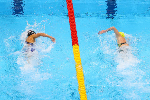 Katie Ledecky (left) and Ariarne Titmus in their Olympic showdown in the 400m freestyle.