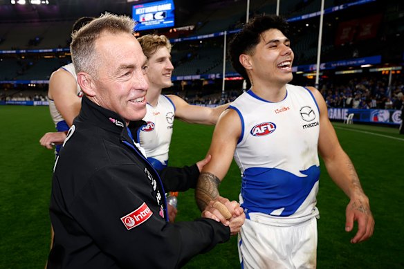 A beaming Alastair Clarkson and Paul Curtis after the final siren following their win over the Bulldogs last month.