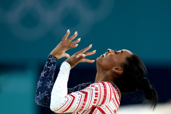 Simone Biles competes in the floor exercise during the artistic gymnastics women’s team final.