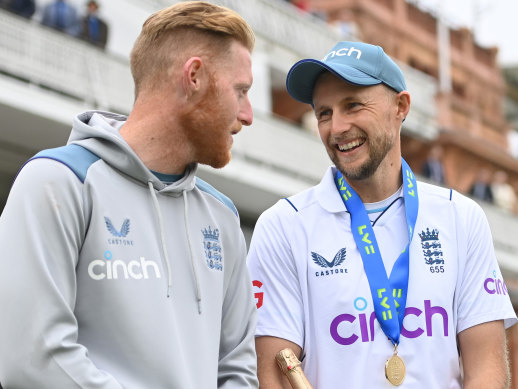 New captain Ben Stokes shares the moment with his predecessor Joe Root.