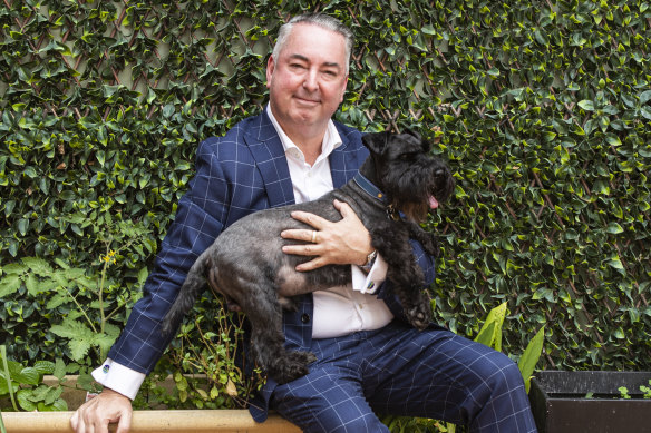 Family lawyer Michael Tiyce with his dog Ferdinand.