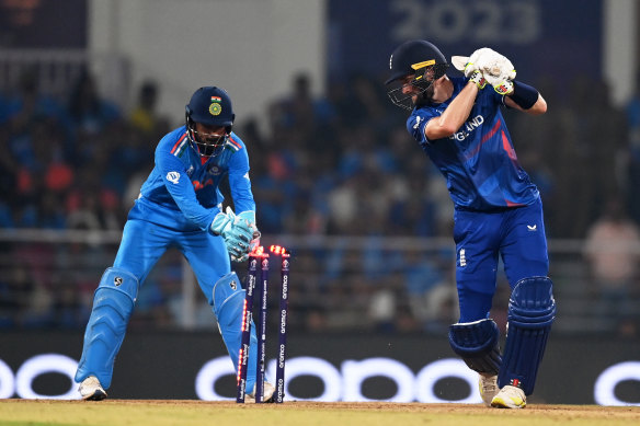 Wicketkeeper K.L. Rahul stumps England’s Chris Woakes during the World Cup.