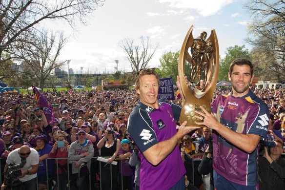 Craig Bellamy and Cam Smith after the Melbourne Storm’s premiership in 2012. 