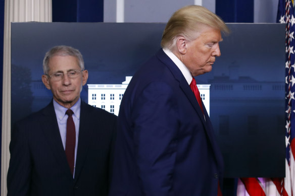 Dr Anthony Fauci, director of the National Institute of Allergy and Infectious Diseases, at a briefing last month with President Donald Trump.