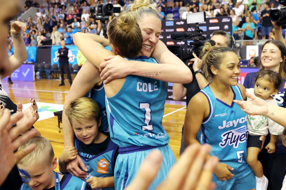 Lauren Jackson celebrates with Rebecca Cole after the Southside Flyers clinched victory on Sunday.