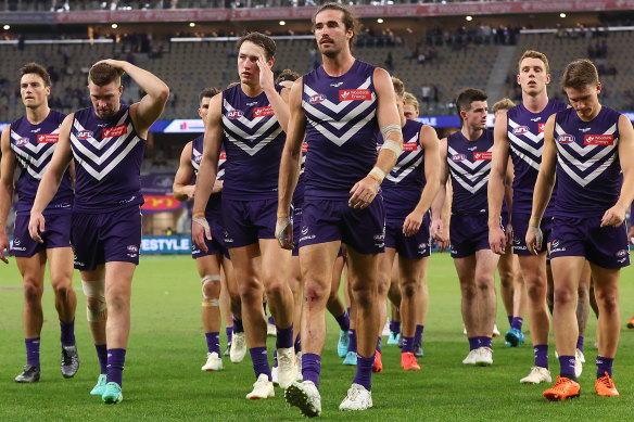 Fremantle captain Alex Pearce leads his team from the field.